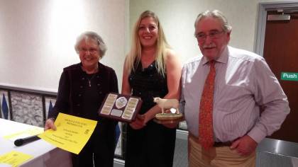 Lousie receiving the trophy on behalf of the Eden Flock